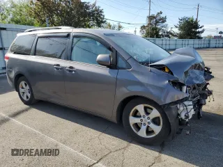 2013 Toyota Sienna LE AAS with VIN 5TDKK3DC8DS285333, listed as a Copart auction lot 54120625 with 136,389 mi miles and Salvage title. Bid and sale history available at DreamBid. Image 4.