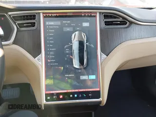 2013 Tesla Model S with VIN 5YJSA1CN7DFP22690, listed as a IAAI auction lot 40981089 with 188,057 mi miles. Bid and sale history available at carsss.com. Image 7.