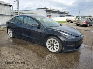 2022 Tesla Model 3 Long Range z VIN 5YJ3E1EB4NF285924, wystawiony jako Copart lot #59734055 z przebiegiem 116 680 mil mil oraz Czysty tytuł • Clean title. Historia ofert i sprzedaży dostępna na DreamBid. Obrazek 4.