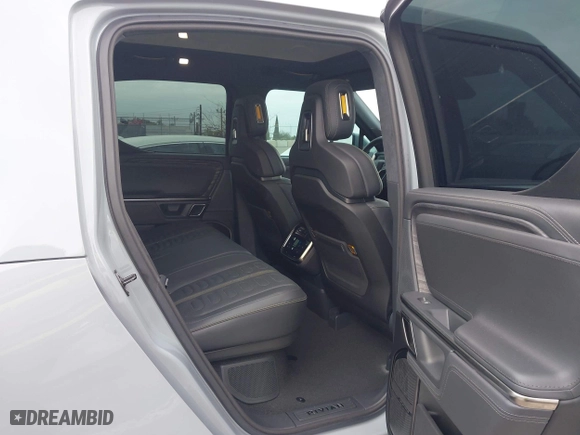 2023 Rivian R1T Launch Edition with VIN 7FCTGAAL3PN017339, listed as a IAAI auction lot 42041423 with 15,098 mi miles. Bid and sale history available at carsss.com. Image 8.