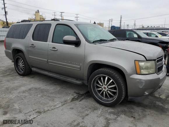 2009 Chevrolet Suburban LT w/2LT with VIN 1GNFC26069R266658, listed as a Copart auction lot 50842325 with 202,852 mi miles and Clean Title. Bid and sale history available at carsss.com. Image 4.