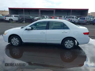 2004 Honda Accord LX with VIN JHMCM56344C005690, listed as a IAAI auction lot 41360785 with 132,915 mi miles and . Bid and sale history available at DreamBid. Image 14.