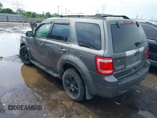 2010 Ford Escape Limited with VIN 1FMCU9E79AKA54071, listed as a IAAI auction lot 42399057 with 117,554 mi miles and . Bid and sale history available at DreamBid. Image 3.