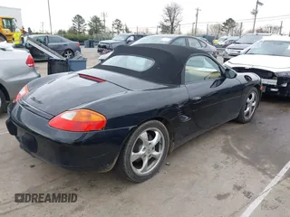 2002 Porsche Boxster z VIN WP0CA298X2U623474, wystawiony jako IAAI lot #41754154 z przebiegiem 98 896 mil mil oraz . Historia ofert i sprzedaży dostępna na DreamBid. Obrazek 4.