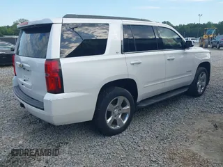 2017 Chevrolet Tahoe LT with VIN 1GNSKBKC3HR356480, listed as a IAAI auction lot 42335162 with 145,892 mi miles and . Bid and sale history available at DreamBid. Image 4.