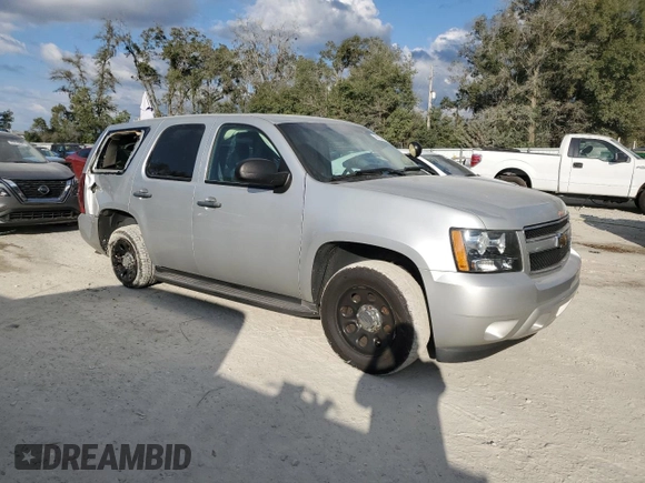 2011 Chevrolet Tahoe Commercial with VIN 1GNLC2E02BR306292, listed as a Copart auction lot 44136095 with 172,104 mi miles and Salvage title. Bid and sale history available at DreamBid. Image 4.