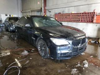 2014 BMW 7 Series ALPINA B7 xDrive with VIN WBAYF8C59ED141718, listed as a Copart auction lot 89348655 with 77,954 mi miles and Salvage Title. Bid and sale history available at DreamBid. Image 4.