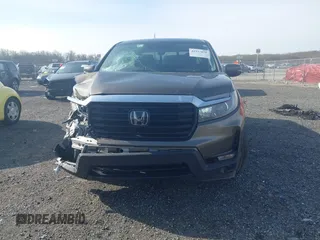 2022 Honda Ridgeline RTL z VIN 5FPYK3F51NB038239, wystawiony jako IAAI lot #41937070 z przebiegiem 39 012 mil mil oraz . Historia ofert i sprzedaży dostępna na DreamBid. Obrazek 12.