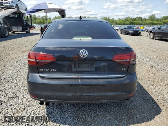 2017 Volkswagen Jetta SEL z VIN 3VWL17AJ6HM404789, wystawiony jako Copart lot #59029645 z przebiegiem 129 788 mil mil oraz Szkoda całkowita • Salvage title. Historia ofert i sprzedaży dostępna na DreamBid. Obrazek 6.