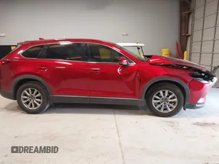 2019 Mazda CX-9 Touring with VIN JM3TCACY1K0331904, listed as a IAAI auction lot 42146945 with 77,699 mi miles and . Bid and sale history available at DreamBid. Image 13.