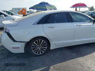2017 Lincoln MKZ Hybrid Premiere с VIN 3LN6L5KU1HR631619, выставлен на аукционе IAAI как лот 39746492 с пробегом Не указан миль и . История ставок и продаж доступна на DreamBid. Изображение 6.