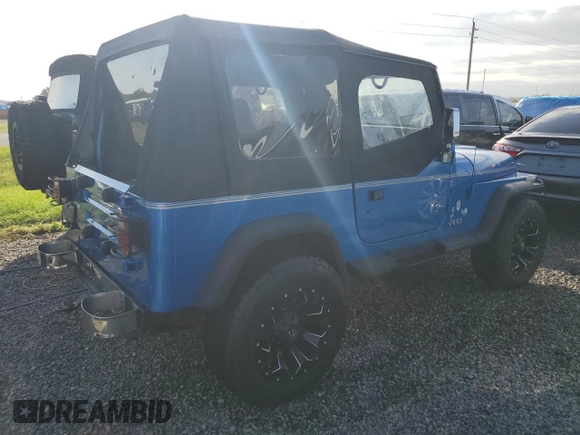 1992 Jeep Wrangler z VIN 2J4FY19P6NJ559597, wystawiony jako Copart lot #74990384 z przebiegiem 150 298 mil mil oraz Szkoda całkowita • Salvage title. Historia ofert i sprzedaży dostępna na DreamBid. Obrazek 3.