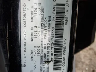 2013 Mazda 3 i SV with VIN JM1BL1TFXD1765660, listed as a Copart auction lot 51045195 with 161,749 mi miles and Salvage Title. Bid and sale history available at DreamBid. Image 12.