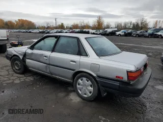1988 Toyota Camry z VIN JT2VV21E8J0008306, wystawiony jako Copart lot #82378704 z przebiegiem 245 078 mil mil oraz Szkoda całkowita • Salvage title. Historia ofert i sprzedaży dostępna na DreamBid. Obrazek 2.