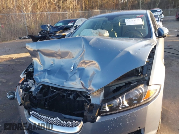 2013 Jaguar XF I4 RWD with VIN SAJWA0ES4DPS95992, listed as a IAAI auction lot 41248969 with 56,024 mi miles. Bid and sale history available at carsss.com. Image 6.