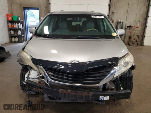 2012 Toyota Sienna XLE with VIN 5TDDK3DC2CS031088, listed as a Copart auction lot 60642845 with 186,586 mi miles and Salvage title. Bid and sale history available at DreamBid. Image 5.