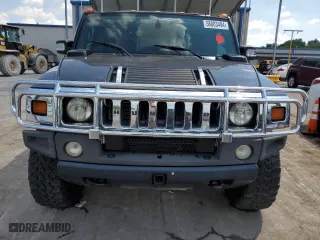 2006 Hummer H2 with VIN 5GRGN23U26H100264, listed as a Copart auction lot 58083494 with 169,104 mi miles and Salvage Title. Bid and sale history available at carsss.com. Image 5.
