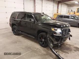 2017 Chevrolet Tahoe LT z VIN 1GNSKBKC6HR310870, wystawiony jako IAAI lot #41975056 z przebiegiem 124 418 mil mil oraz . Historia ofert i sprzedaży dostępna na DreamBid. Obrazek 1.