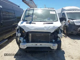 2016 Ford Transit Cargo z VIN 1FTYR1YM6GKB55690, wystawiony jako IAAI lot #41806571 z przebiegiem 97 623 mil mil oraz . Historia ofert i sprzedaży dostępna na DreamBid. Obrazek 6.