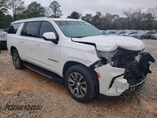 2021 Chevrolet Suburban with VIN 1GNSCCKT6MR473628, listed as a Copart auction lot 87695725 with 57,110 mi miles and Salvage title. Bid and sale history available at DreamBid. Image 4.