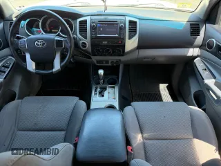 2013 Toyota Tacoma with VIN 5TFLU4EN1DX063442, listed as a Copart auction lot 62521295 with 211,682 mi miles and Clean title. Bid and sale history available at DreamBid. Image 9.