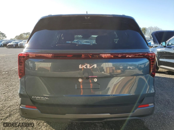2025 Kia Carnival SX with VIN KNDNE5K33S6458904, listed as a Copart auction lot 81029124 with 0 mi miles and Salvage Title. Bid and sale history available at carsss.com. Image 6.