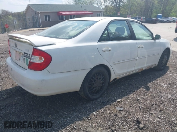 2003 Toyota Camry LE with VIN JTDBE32K830222476, listed as a IAAI auction lot 42160720 with 161,570 mi miles and . Bid and sale history available at DreamBid. Image 4.
