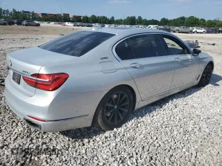 2017 BMW 7 Series 740e xDrive iPerformance with VIN WBA7J2C3XHG497958, listed as a Copart auction lot 58203604 with 75,256 mi miles and Salvage Title. Bid and sale history available at carsss.com. Image 3.