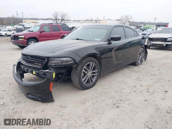 2019 Dodge Charger SXT with VIN 2C3CDXJG7KH757728, listed as a IAAI auction lot 41797017 with 68,063 mi miles and . Bid and sale history available at DreamBid. Image 16.
