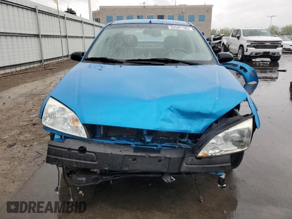 2007 Ford Focus S z VIN 1FAFP34N47W164846, wystawiony jako Copart lot #55587185 z przebiegiem 41 172 mil mil oraz Szkoda całkowita • Salvage title. Historia ofert i sprzedaży dostępna na DreamBid. Obrazek 5.