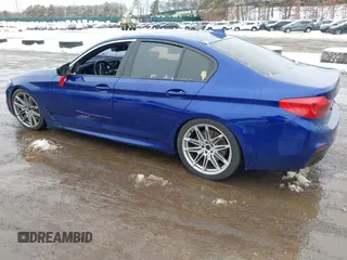 2018 BMW 5 Series 540i xDrive with VIN WBAJE7C5XJWC56733, listed as a IAAI auction lot 41558451 with 67,460 mi miles and . Bid and sale history available at DreamBid. Image 3.