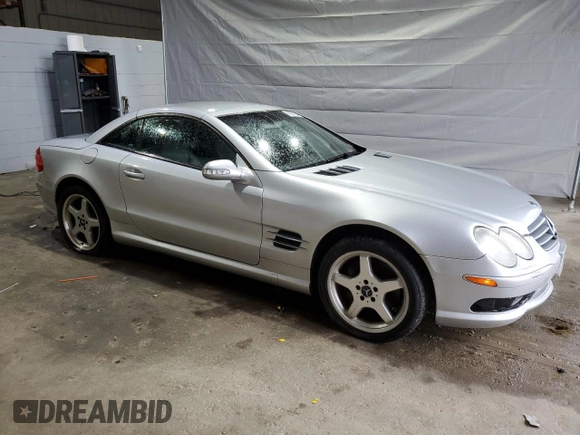 2003 Mercedes-Benz SL 500 z VIN WDBSK75FX3F061879, wystawiony jako Copart lot #55930265 z przebiegiem 117 824 mil mil oraz Tytuł czysty. Historia ofert i sprzedaży dostępna na DreamBid. Obrazek 4.