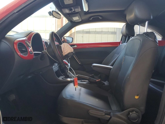 2012 Volkswagen Beetle 2.5L with VIN 3VWJX7AT7CM662822, listed as a Copart auction lot 74215804 with 115,890 mi miles and Salvage Title. Bid and sale history available at carsss.com. Image 7.
