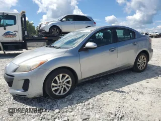 2012 Mazda 3 i Touring with VIN JM1BL1V71C1594687, listed as a Copart auction lot 64171185 with 148,631 mi miles and Salvage title. Bid and sale history available at DreamBid. Image 1.