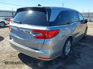2018 Honda Odyssey EX-L with VIN 5FNRL6H71JB077112, listed as a IAAI auction lot 41721523 with 70,893 mi miles. Bid and sale history available at carsss.com. Image 4.