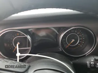 2021 Jeep Wrangler Unlimited Willys с VIN 1C4HJXDG9MW740262, выставлен на аукционе Copart как лот 54051745 с пробегом Не указан миль и Списание • Salvage title. История ставок и продаж доступна на DreamBid. Изображение 9.