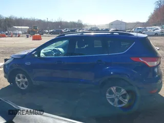 2013 Ford Escape SE with VIN 1FMCU9GX5DUB20394, listed as a IAAI auction lot 41889989 with 121,417 mi miles. Bid and sale history available at carsss.com. Image 13.