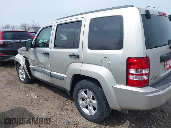 2009 Jeep Liberty Sport with VIN 1J8GN28K69W512320, listed as a IAAI auction lot 41970015 with 115,443 mi miles. Bid and sale history available at carsss.com. Image 14.
