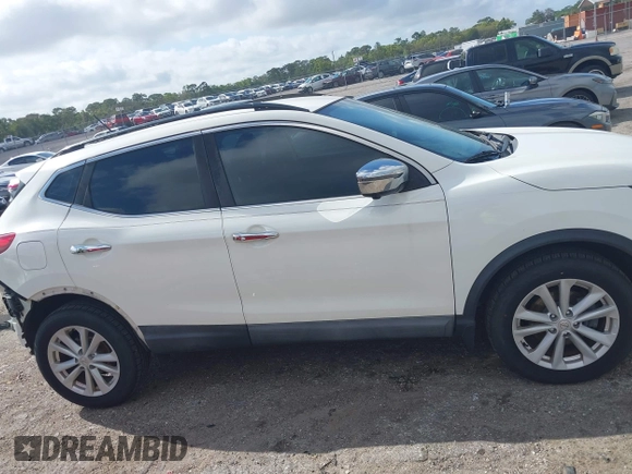 2017 Nissan Rogue SV z VIN JN1BJ1CP7HW007270, wystawiony jako IAAI lot #41908931 z przebiegiem 94 373 mil mil oraz . Historia ofert i sprzedaży dostępna na DreamBid. Obrazek 14.