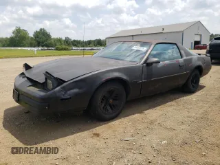 1989 Pontiac Firebird z VIN 1G2FS21S5KL205321, wystawiony jako Copart lot #66481815 z przebiegiem 142 670 mil mil oraz Czysty tytuł • Clean title. Historia ofert i sprzedaży dostępna na DreamBid. Obrazek 1.