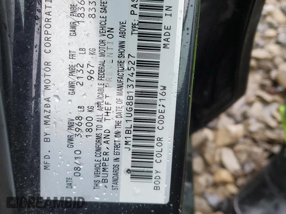 2011 Mazda 3 i Sport with VIN JM1BL1UG8B1374527, listed as a Copart auction lot 54906065 with 137,678 mi miles and Salvage Title. Bid and sale history available at DreamBid. Image 12.