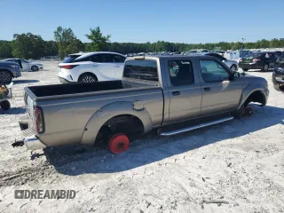 2004 Nissan Frontier XE z VIN 1N6ED29X94C473256, wystawiony jako Copart lot #57796125 z przebiegiem 306 316 mil mil oraz Czysty tytuł • Clean title. Historia ofert i sprzedaży dostępna na DreamBid. Obrazek 3.