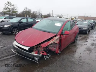 2024 Tesla Model Y Long Range with VIN 7SAYGAEE7RF133073, listed as a IAAI auction lot 41081463 with Not Provided miles and . Bid and sale history available at DreamBid. Image 6.