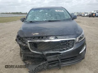 2021 Kia Sedona LX with VIN KNDMB5C17M6665266, listed as a Copart auction lot 48129495 with 57,274 mi miles and Salvage Title. Bid and sale history available at carsss.com. Image 5.