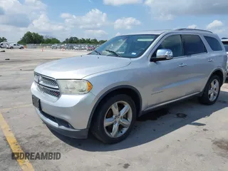 2013 Dodge Durango Citadel with VIN 1C4RDHEG0DC571833, listed as a IAAI auction lot 42736033 with 110,808 mi miles and . Bid and sale history available at DreamBid. Image 2.
