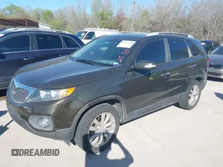 2011 Kia Sorento EX with VIN 5XYKU4A22BG095372, listed as a IAAI auction lot 41852948 with 265,609 mi miles. Bid and sale history available at carsss.com. Image 2.