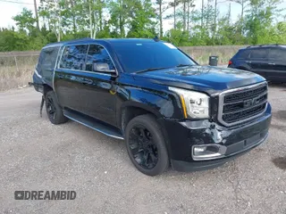 2020 GMC Yukon XL z VIN 1GKS1JKC1LR305627, wystawiony jako IAAI lot #41971401 z przebiegiem 73 333 mil mil oraz . Historia ofert i sprzedaży dostępna na DreamBid. Obrazek 1.
