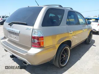 2004 Acura MDX Touring Pkg with VIN 2HNYD18654H541496, listed as a IAAI auction lot 42107886 with 234,306 mi miles. Bid and sale history available at carsss.com. Image 4.