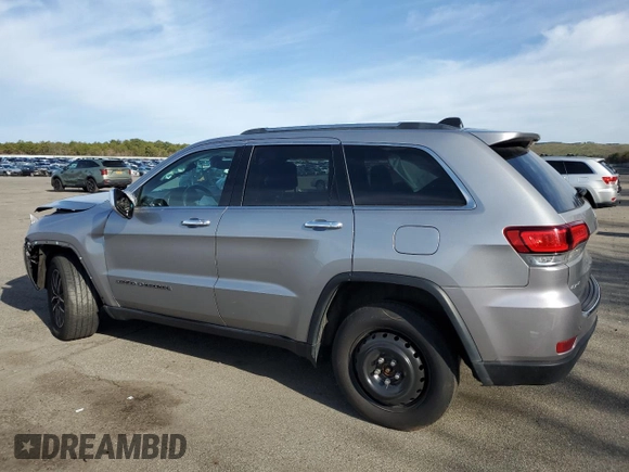 2021 Jeep Grand Cherokee 80th Anniversary with VIN 1C4RJFBG7MC665757, listed as a Copart auction lot 52443235 with 99,828 mi miles and Salvage Title. Bid and sale history available at DreamBid. Image 2.