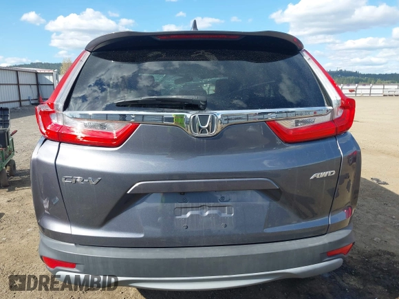 2018 Honda CR-V EX with VIN 2HKRW2H51JH664135, listed as a IAAI auction lot 42015075 with 94,996 mi miles. Bid and sale history available at carsss.com. Image 15.